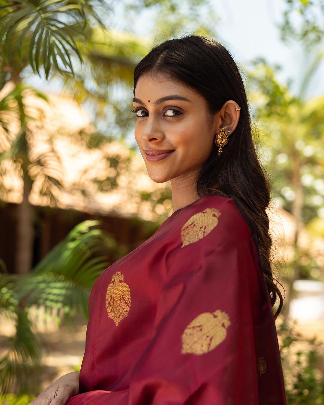 Maroon Kanjivaram Silk Saree with Golden Motifs