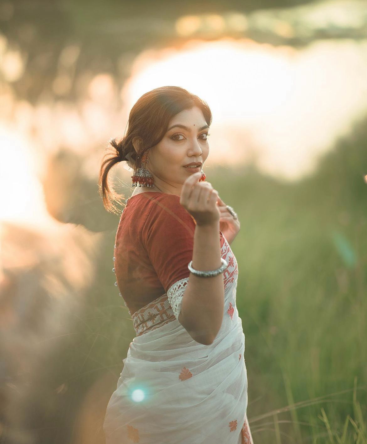 Crimson Elegance Tant Saree